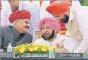  ??  ?? ■ Sukhjinder Singh Randhawa (right) with Punjab governor VP Singh Badnore and the chief minister.