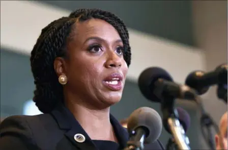  ?? SUSAN WALSH — THE ASSOCIATED PRESS ?? Rep.-elect Ayanna Pressley, D-Mass., listens during a news conference with members of the Progressiv­e Caucus in Washington, Monday.