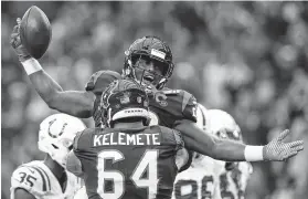  ?? Godofredo A. Vasquez / Staff photograph­er ?? With weather conditions not expected to be conducive to the passing game today, the Texans hope Alfred Blue and their rushing attack have much to celebrate.