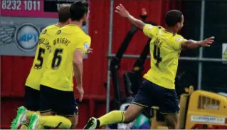  ?? PICTURE: Oxford United ?? OH YES! Kemar Roofe celebrates his wonder strike