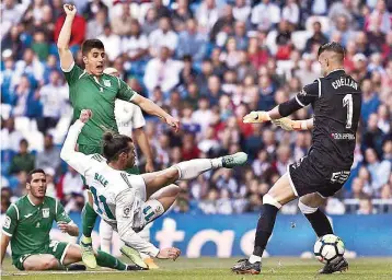  ??  ?? Real Madrid’s Gareth Bale hits half-voolley against Leganes in Madrid on Sautrday