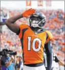  ?? Joe Mahoney ?? The Associated Press Denver Broncos wide receiver Emmanuel Sanders celebrates his touchdown against the Dallas Cowboys during the first half of Sunday’s game.