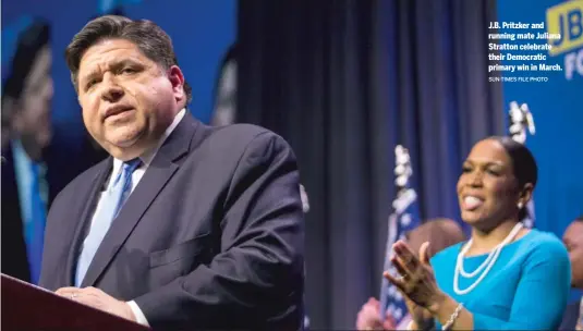  ?? SUN-TIMES FILE PHOTO ?? J.B. Pritzker and running mate Juliana Stratton celebrate their Democratic primary win in March.