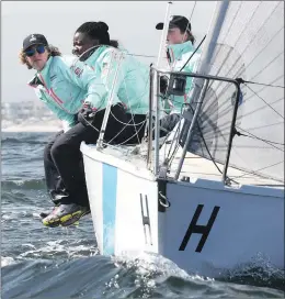  ??  ?? POWER: Members of the women’s team from Zeekoevlei Yacht Club in action at the start of the race.