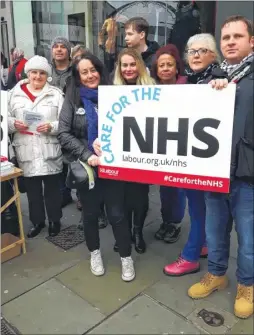  ??  ?? Labour supporters call on Maidstone shoppers to sign a petition calling on the government to do more for the NHS