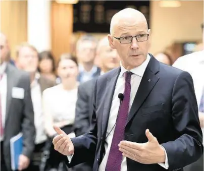  ??  ?? FACING QUESTIONS: John Swinney said the named person scheme relies on co-operation