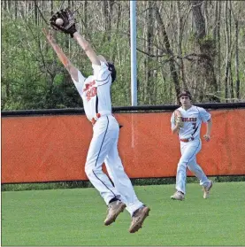  ??  ?? LaFayette shortstop Blake Mann robs a Pickens hitter of a base hit during last Friday’s home game against the Dragons. (Photo by Scott Herpst)