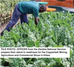  ?? ?? FILE PHOTO: OFFICER from the Zambia National Service prepare their stand in readiness for the Copperbelt Mining, Agricultur­e and Commercial Show in Kitwe.