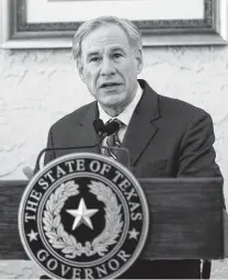  ?? Justin Rex / Associated Press ?? “Personal vigilance is still needed to contain COVID. It’s just that now, state mandates are no longer needed,” Gov. Greg Abbott said, adding that Texans should continue safe habits.