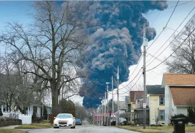  ?? GENE J. PUSKAR/AP ?? Thick smoke rises Feb. 6 over East Palestine, Ohio, after the controlled detonation of a portion of a train derailment.