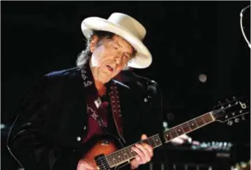  ??  ?? This file photo taken on June 11, 2009 shows US singer Bob Dylan performing during the 37th AFI Life Achievemen­t Award: A Tribute to Michael Douglas at Sony Pictures in Culver City, California.—AFP