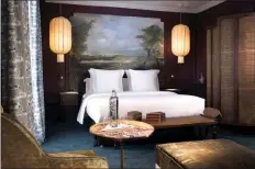 ?? CHRISTOPHE BIELSA ?? This seductive bedroom in Hotel Monte Cristo echoes the luxury and cosmopolit­an style of 19th century Paris.