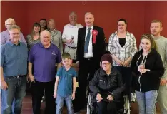  ??  ?? Numbers game James Kelly pops in on a bingo club in Westburn