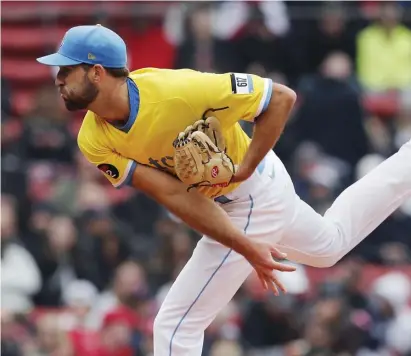  ?? Ap ?? IN THE ZONE: Michael Wacha delivers to the plate during the first inning of the Red Sox’ 8-1 win over the Minnesota Twins on Sunday at Fenway Park.