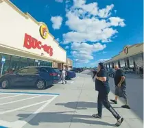  ?? AMY DREW THOMPSON/ORLANDO SENTINEL ?? Texax-based Buc-ee’s will open a third location in Florida. The store offers barbecue and beaver nuggets.