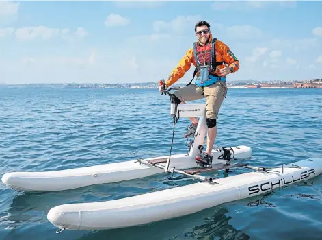  ??  ?? GO ECO: Pedal 4 Parks founder Isaac Kenyon’s water bike crossed the Pentland Firth in an hour and 40 minutes.