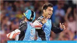  ??  ?? Rashid Khan celebrates after taking a wicket.