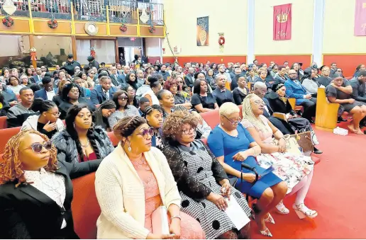  ?? PHOTO BY DAVE RODNEY ?? Mourners attending the morning send-off for Jamaican celebrity chef Alton Henry in New Jersey yesterday.