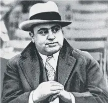  ?? AP ?? A diamond pocket watch that belonged to Al Capone sold for $ 84,375 at the “Gangsters, Outlaws and Lawmen” auction.
|