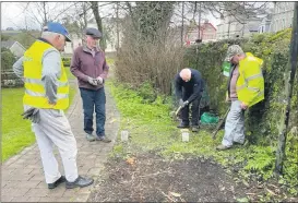  ?? ?? Members of Lismore Tidy Towns work team starting preparator­y work for the building of new compost bays in the Millennium Park. From left Sean Daly, Pat Fleming, Billy Ormonde and Liam Ahearne.