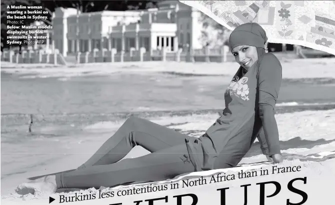  ?? Photo: IC ?? A Muslim woman wearing a burkini on the beach in Sydney.