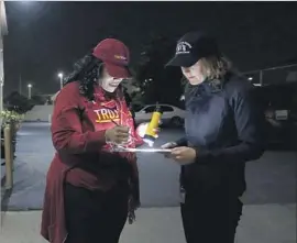  ??  ?? SCOTT-HALCROMB, left, and Mahin work on their tally. A woman who was staying in a motel couldn’t be counted, though she’d been homeless the day before.