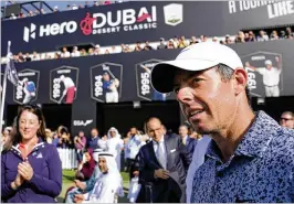  ?? KAMRAN JEBRELLI/AP ?? Rory Mcilroy, an outspoken critic of LIV Golf, took special satisfacti­on in beating Patrick Reed by one stroke to win the Dubai Desert Classic on Monday.