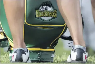  ?? JONATHAN HAYWARD/THE CANADIAN PRESS ?? Ontario pro golfer Alena Sharp carried a Humboldt Broncos-themed golf bag during the CP Women’s Open in Regina last week. She then donated the bag to a Saskatoon children’s hospital currently under constructi­on.