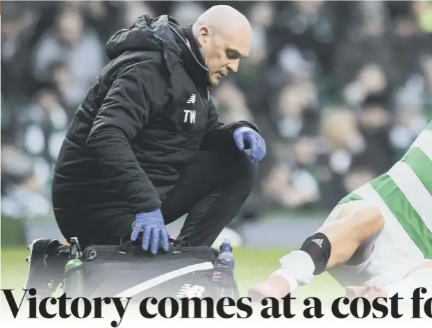  ??  ?? 0 Leigh Griffiths beats the turf in frustratio­n after suffering a calf strain minutes after scoring Celtic’s winner on Saturday, while Craig Gordon, right, is thought to have damaged knee ligaments in this collision with Hibs defender, Efe Ambrose.