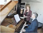  ?? AFP ?? Opera singer Renee Fleming poses with composer Kevin Puts as she practices at her apartment in New York City for an upcoming premiere.