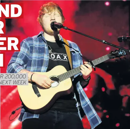  ??  ?? Ed Sheeran playing live and, below, Ed with his MBE for his services to music and charity