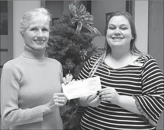  ?? Special to The Herald ?? On behalf of AlleyCATS Alliance,Theresa Nolet receives a cheque for $500 from Kyria Howard, who chose the charity to benefit from her efforts through the Valley First Lead Well program.