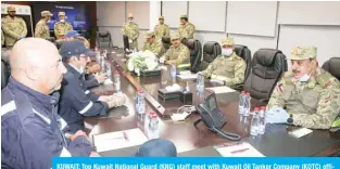  ??  ?? KUWAIT: Top Kuwait National Guard (KNG) staff meet with Kuwait Oil Tanker Company (KOTC) officials during the visit. —KNG photos