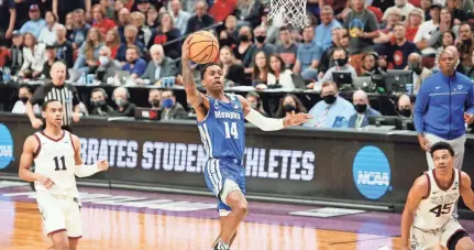  ?? SOOBUM IM/USA TODAY SPORTS ?? Memphis guard Tyler Harris goes for a layup against Gonzaga during a 2022 game.