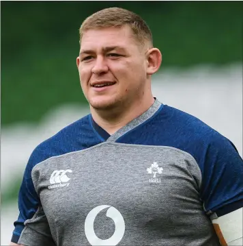  ??  ?? Tadhg Furlong looking relaxed at the captain’s run in the Aviva Stadium on Friday.