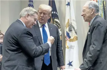  ?? THE ASSOCIATED PRESS FILES ?? U. S. President Donald Trump greets Sen. Lindsey Graham, left, and Sen. Chuck Grassley, right, as they meet to discuss immigratio­n on Jan. 4. A group of bipartisan senators reached a deal to protect young immigrants taken to the U. S. as children, but...