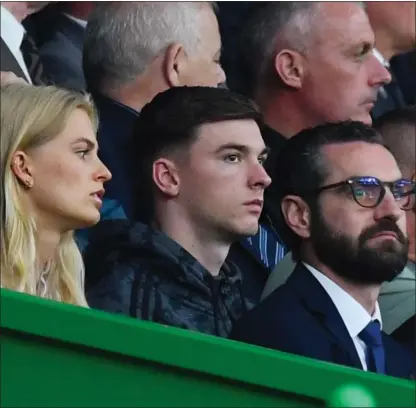  ??  ?? Kieran Tierney takes in the Sarajevo tie from the stands at Celtic Park amid interest from Arsenal