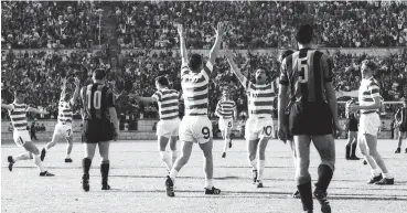  ??  ?? Victorious: Celtic players celebrate Stevie Chalmers’ goal only six minutes from the end of the game – a shot which would see them crowned champions