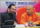  ?? HT PHOTO ?? ▪ Union minority affairs minister Mukhtar Abbas Naqvi with chief minister Yogi Adityanath in Lucknow on Thursday.