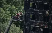  ?? PICTURE: REUTERS ?? Firefighte­rs at west London’s Grenfell Tower apartments, which was destroyed by a fire that killed at least 30 people on Wednesday.