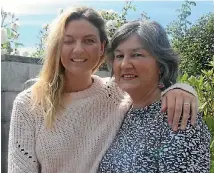  ?? PHOTO: DASHA KUPRIENKO/ STUFF ?? Three times NZ downhill mountain biking champion Alanna Columb with her mother Marilyn Columb in Queenstown. Alanna is recovering from her severe brain injury and a coma after a bike accident.