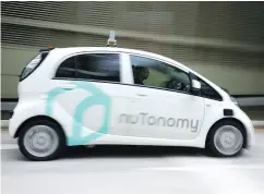  ?? YONG TECK LIM / THE ASSOCIATED PRESS FILES ?? A nuTonomy autonomous vehicle on a test drive in Singapore. Your car is about to become a non-stop, 24-hour mobile Shopping Channel.