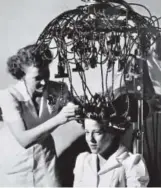  ??  ?? Cosmetolog­y students at Emily Griffith learn to use perm equipment, circa 1950.