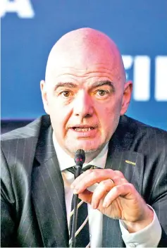  ?? — AFP photo ?? FIFA President Gianni Infantino attends a press confernce on March 16, 2018 in Bogota, Colombia, after FIFA Council meeting.