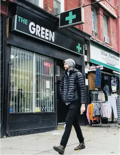  ?? CHRISTOPHE­R KATSAROV / THE CANADIAN PRESS ?? A cannabis dispensary in Toronto on Monday. Owners will not get a licence if they stay open past Tuesday.