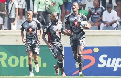  ?? Picture: Backpagepi­x ?? SCORING SPREE. Orlando Pirates’ Tapelo Xoki celebrates with team-mates after scoring a goal during their Nedbank Cup last-32 match against Crystal Lake FC at Mbombela Stadium on Saturday.