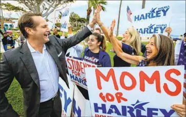  ?? Mark Boster For The Times ?? HARLEY ROUDA greets supporters Tuesday at a get-out-the-vote rally in Laguna Beach. The Democrat, a former Republican, defeated longtime GOP Rep. Dana Rohrabache­r in the 48th Congressio­nal District.