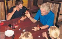  ??  ?? Sir Richard Branson rides out Hurricane Irma with guests in his wine cellar on Necker Island.