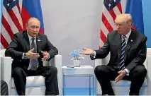  ?? PHOTO: REUTERS ?? Presidents Vladimir Putin and Donald Trump talk to the media after their official meeting at the G20 summit in Germany. Later that day they met informally for an hour at a leaders’ dinner.