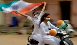  ?? — PTI ?? College girls in Chennai paint their faces with the tricolour as they celebrate the 71st Independen­ce Day in Chennai on Tuesday.